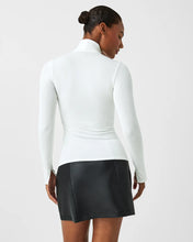 Load image into Gallery viewer, Model wearing Spanx - Long Sleeve Turtleneck in Powder - back.