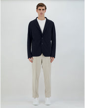 Load image into Gallery viewer, Model wearing Herno - Blazer in Non-Washed Light Scuba in Blue Navy.