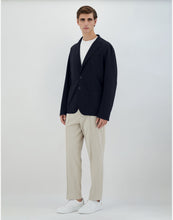 Load image into Gallery viewer, Model wearing Herno - Blazer in Non-Washed Light Scuba in Blue Navy.