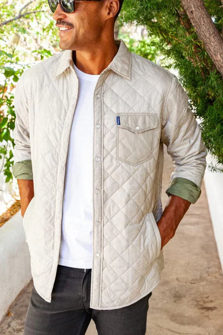 Model wearing Criquet - Quilted Shacket in Stone.