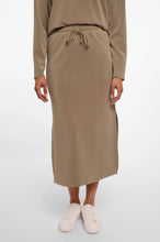 Load image into Gallery viewer, Model wearing Rino & Pelle - Sandy Neoprene/Scuba Skirt in Dark Khaki.
