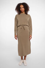 Load image into Gallery viewer, Model wearing Rino & Pelle - Sandy Neoprene/Scuba Skirt in Dark Khaki.