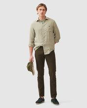 Load image into Gallery viewer, Model wearing Rodd & Gunn - Motion 2 Straight Jean RL Seaweed.