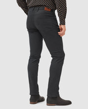 Load image into Gallery viewer, Model wearing Rodd & Gunn - Motion Melange Straight Fit Jean in Onyx - back.