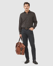Load image into Gallery viewer, Model wearing Rodd & Gunn - Motion Melange Straight Fit Jean in Onyx.