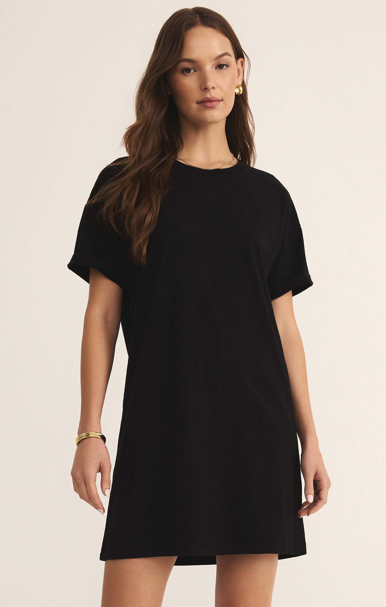 Model wearing ZSupply Sway Mini Dress in True Black.