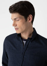 Load image into Gallery viewer, Model wearing Sunspel - Button Down Flannel Shirt in Navy Melange.