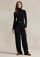 Load image into Gallery viewer, Model wearing Polo Ralph Lauren - Stretch Ribbed Turtleneck in Black.