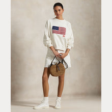 Load image into Gallery viewer, Model wearing Polo Ralph Lauren - Logo Flag French Terry Crewneck Sweatshirt in Nevis.
