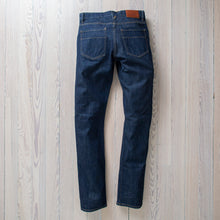 Load image into Gallery viewer, Raleigh Denim Martin thin taper resin rinse jeans back view..