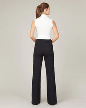 Load image into Gallery viewer, Model wearing Spanx - The Perfect Pant, Hi-Rise Flare in Classic Black 20252R - back.