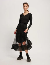 Load image into Gallery viewer, Model wearing Leo &amp; Ugo - Beatice Skirt in Black.
