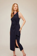 Load image into Gallery viewer, Model wearing Fifteen Twenty - Maddie Side Knot Midi Dress in Navy.
