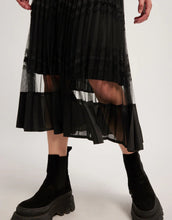 Load image into Gallery viewer, Model wearing Leo &amp; Ugo - Beatice Skirt in Black.
