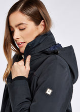 Load image into Gallery viewer, Model wearing Dubarry - Beaufort Travel Coat in Navy.
