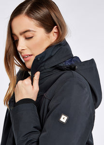 Model wearing Dubarry - Beaufort Travel Coat in Navy.