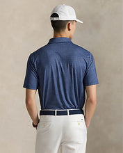 Load image into Gallery viewer, model wearing RLX- SS Lightweight Airflow Printed Polo - Navy Golf Buggy - back
