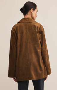 Model wearing ZSupply Decker Suede Chore Jacket in Coconut - back.