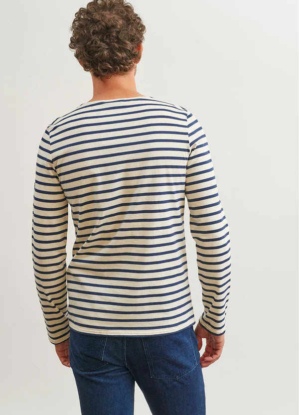 Model wearing Saint James - Minquiers Modern Men's Striped Sailor Shirt in Ecru/Marine - back.