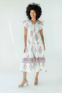 Model wearing Victoria Dunn - Rosa Dress in Lemon Drop.