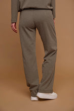 Load image into Gallery viewer, Model wearing Rino &amp; Pelle - Bindina Wide Leg Trousers in Stone Graphics - back.
