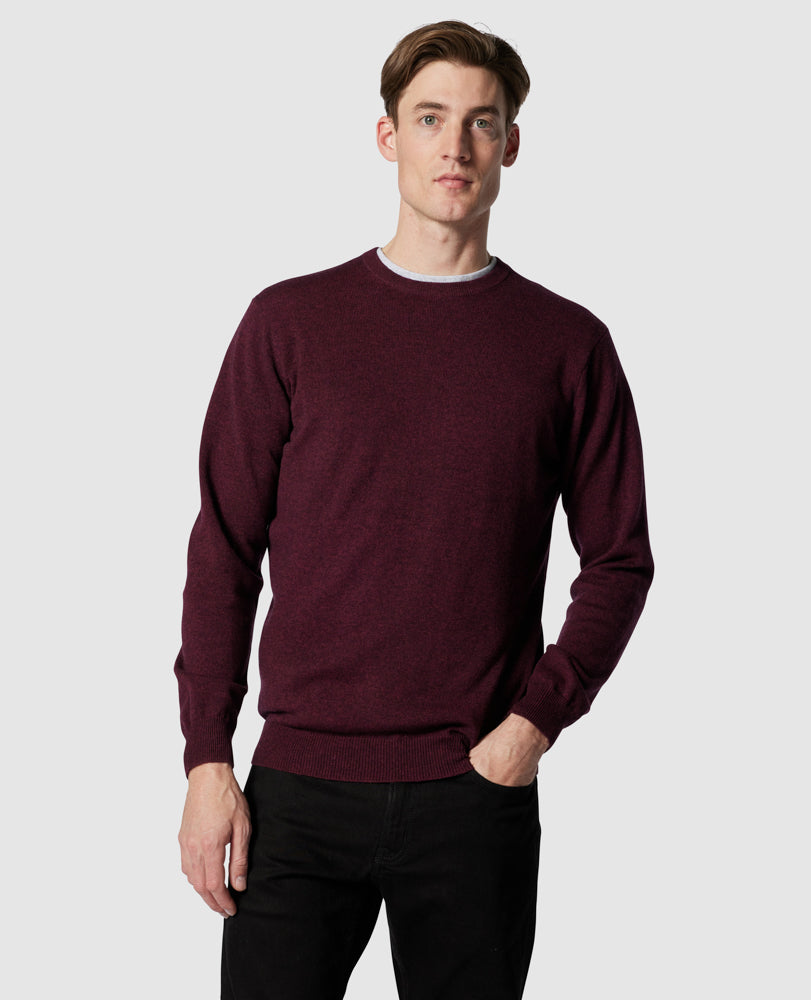 Model wearing Rodd & Gunn - Queenstown Sweater in Rust.