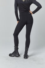 Load image into Gallery viewer, Model wearing Alp N Rock - Geneva Techno Pant in Black - back.
