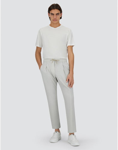 Model wearing Herno - Men's Nylon Maestro Trouser in Chantilly.