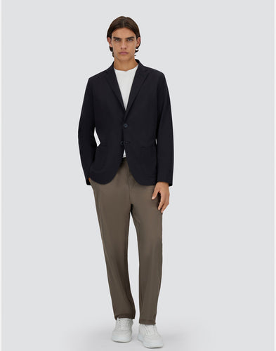 Model wearing Herno Men's Seer-Crease Blazer in Blu Navy.