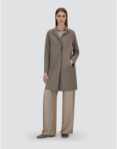 Model wearing Herno Women's Act First Scuba Snap Front Jacket - Taupe.