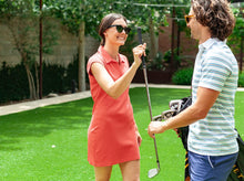 Load image into Gallery viewer, Model wearing Criquet - Women&#39;s Ladybird Polo Dress in Slow Burn.
