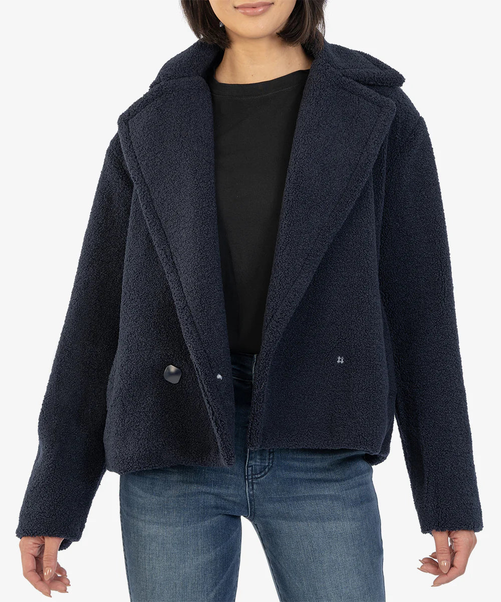 Model wearing Kut from the Kloth - Emaline Double Breasted Sherpa Coat in Navy.