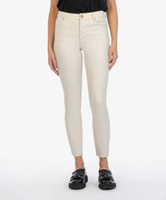 Load image into Gallery viewer, Model wearing KUT From The Kloth Charlize Coated High Rise Cigarette Leg Raw Hem Jean KP1738MA4 in Champagne.
