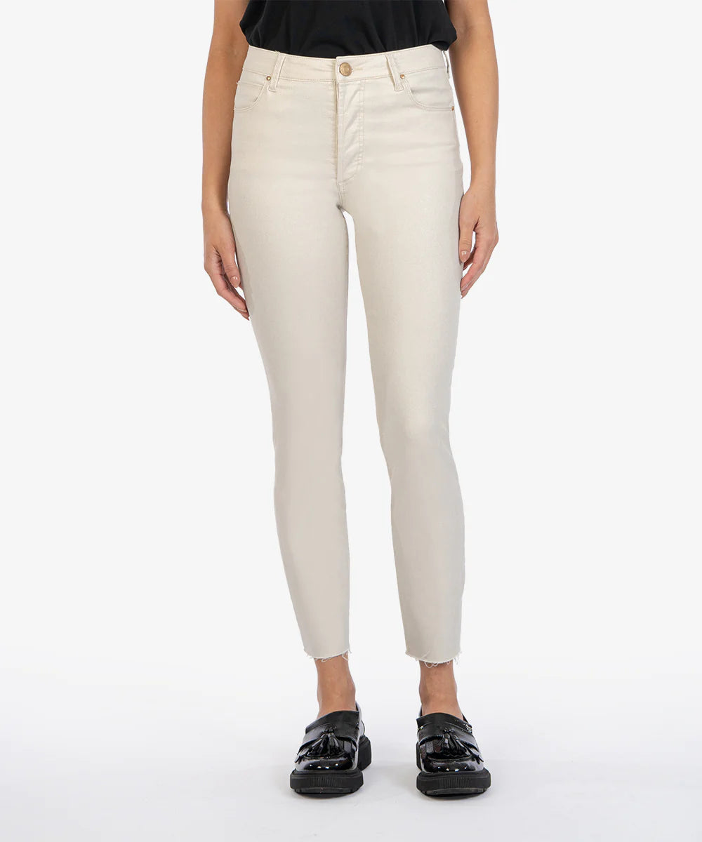 Model wearing KUT From The Kloth Charlize Coated High Rise Cigarette Leg Raw Hem Jean KP1738MA4 in Champagne.
