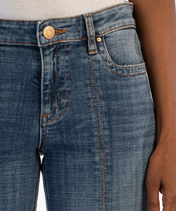 Model wearing Kut From The Kloth - Stevie Straight Leg - Princess Seam at Frt w/ Slit in Evaluate w/ Dk Base Wash.