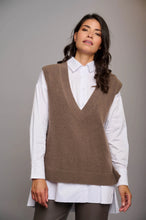 Load image into Gallery viewer, Model wearing Rino &amp; Pelle - V-Neck Sweater Vest in Taupe.
