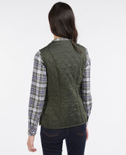 Load image into Gallery viewer, Model wearing Barbour Fleece Betty Liner in Dark Olive - back.
