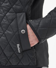 Load image into Gallery viewer, Model wearing Barbour Yarrow Quilt in Black/Rose Garden Floral.
