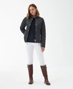 Model wearing Barbour Yarrow Quilt in Black/Rose Garden Floral.