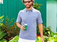 Load image into Gallery viewer, Model wearing Criquet - Top-Shelf Players Polo Mircrostripe in Blue.
