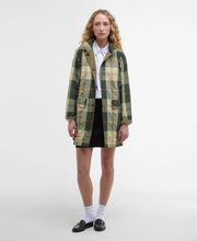 Load image into Gallery viewer, Model wearing Barbour Babbity Reversible Showerproof Jacket in Dusky Green/Ancient.
