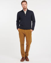 Load image into Gallery viewer, Model wearing Barbour Gamlin Half Zip Sweater in Navy.
