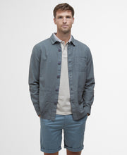 Load image into Gallery viewer, Model wearing Barbour Callercove Seersucker Overshirt in Vintage Teal.
