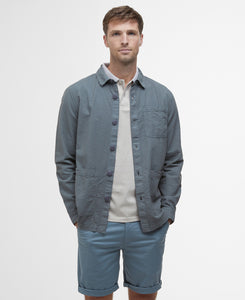 Model wearing Barbour Callercove Seersucker Overshirt in Vintage Teal.