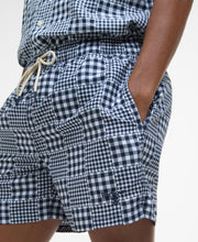 Load image into Gallery viewer, Model wearing Barbour Willowbeach Swim Short in Navy.
