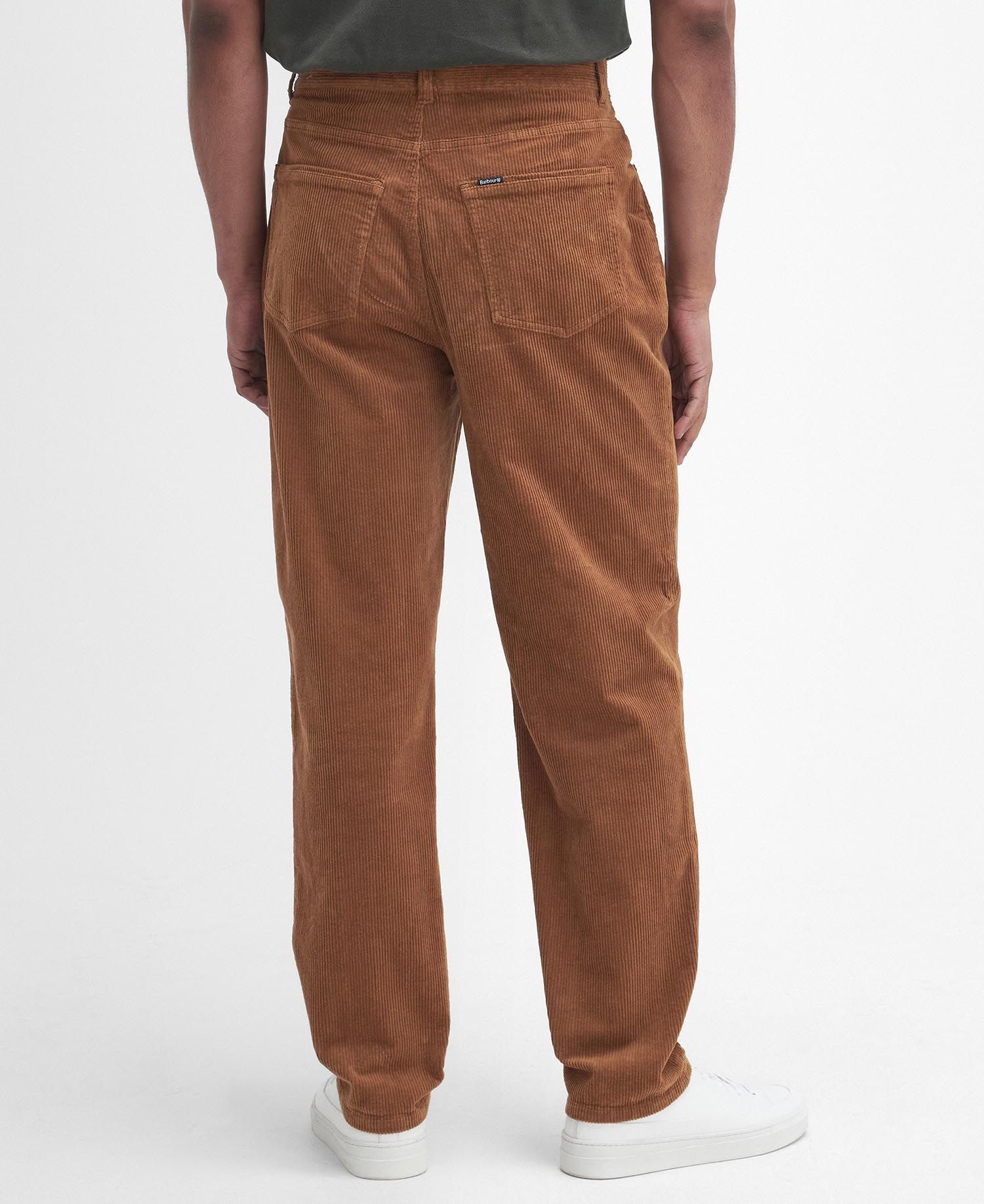 Model wearing Barbour Stretch Cord Trouser in Dark Honey - back.