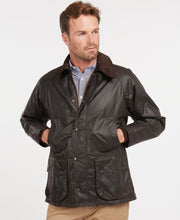 Load image into Gallery viewer, Model wearing Barbour Bedale Wax Jacket in Rustic.
