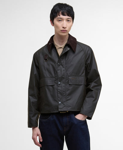 Model wearing Barbour Spey Wax Jacket in Olive. 