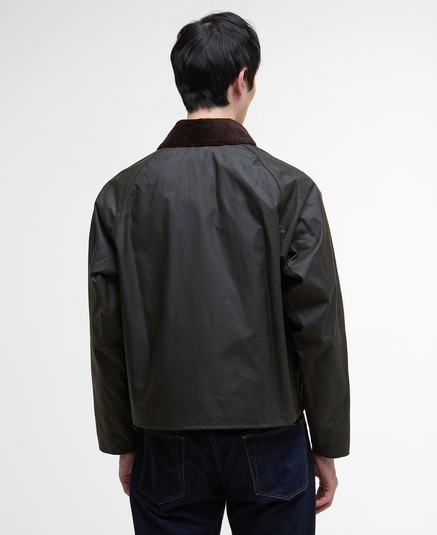 Model wearing Barbour Spey Wax Jacket in Olive - back. 