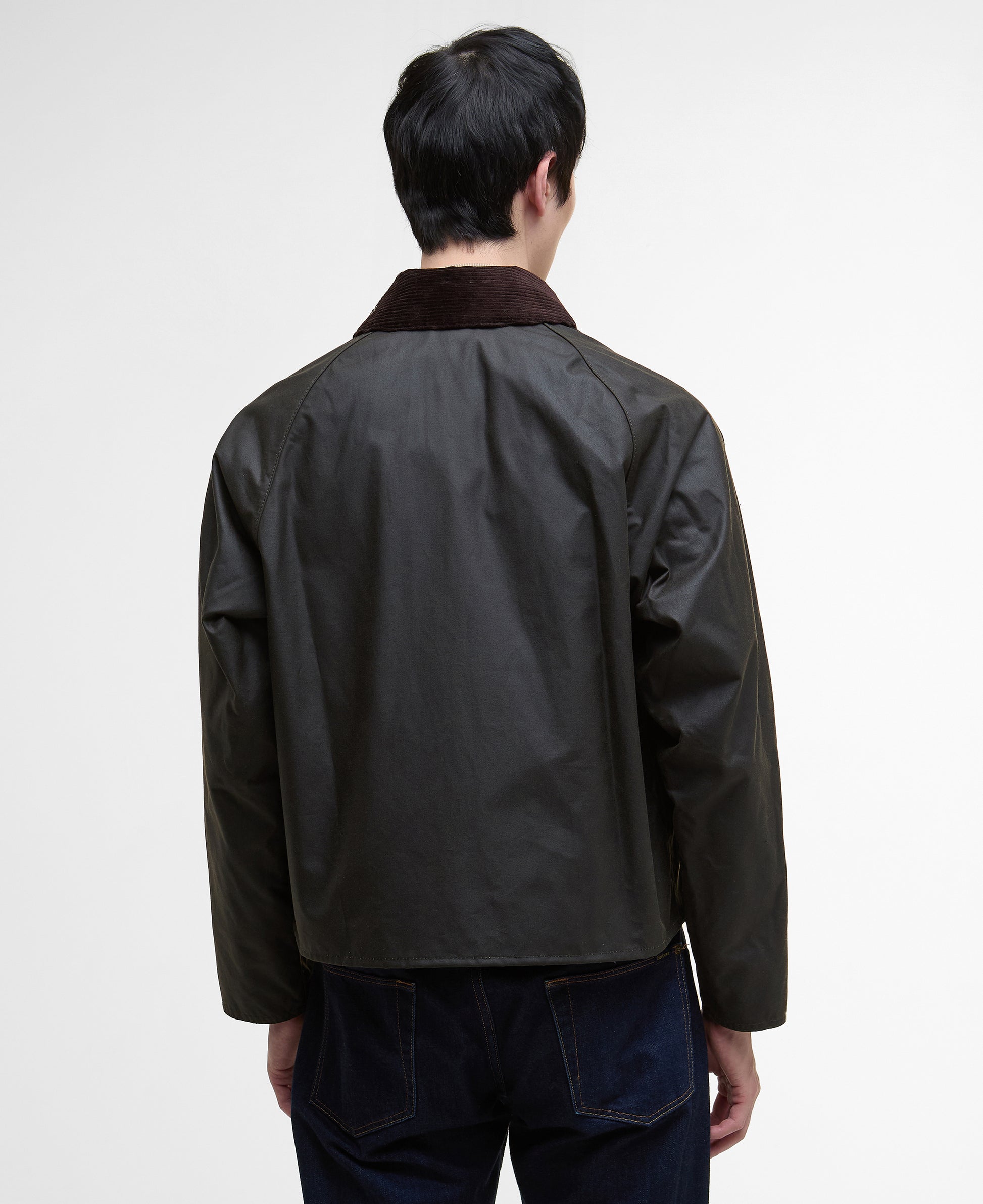 Model wearing Barbour Spey Wax Jacket in Olive - back. 